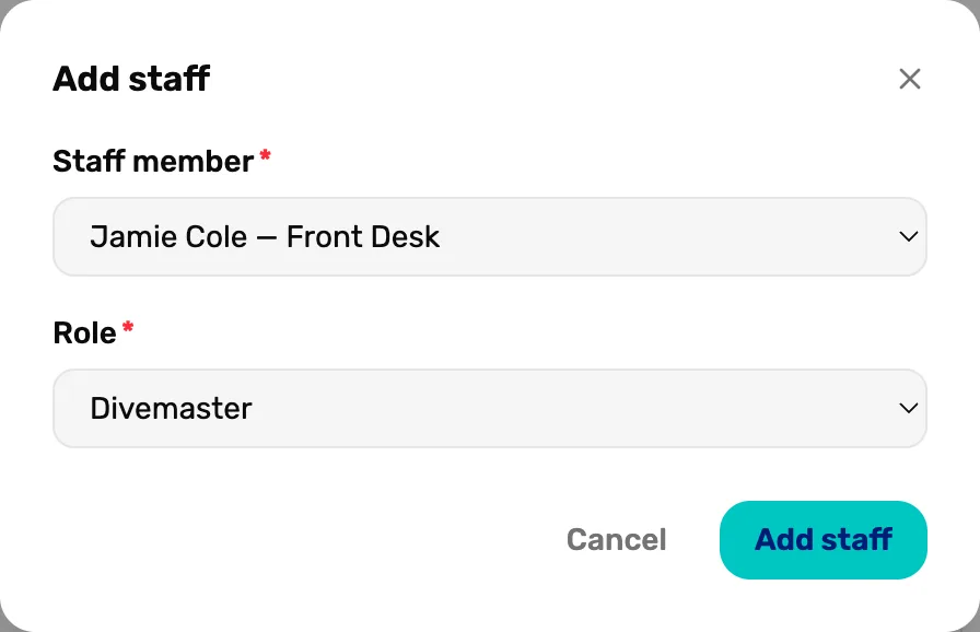 The Add staff box: Staff member set to Jamie Cole — Front Desk, Role set to Divemaster, Cancel and Add staff