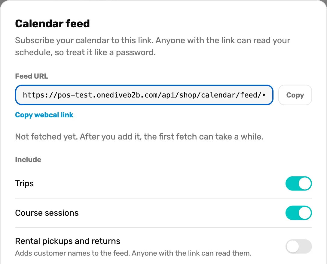 The Calendar feed window: the warning to treat the link like a password, Feed URL with the start of the link and a Copy button, Copy webcal link, the line Not fetched yet. After you add it, the first fetch can take a while., and Include with Trips on, Course sessions on and Rental pickups and returns off