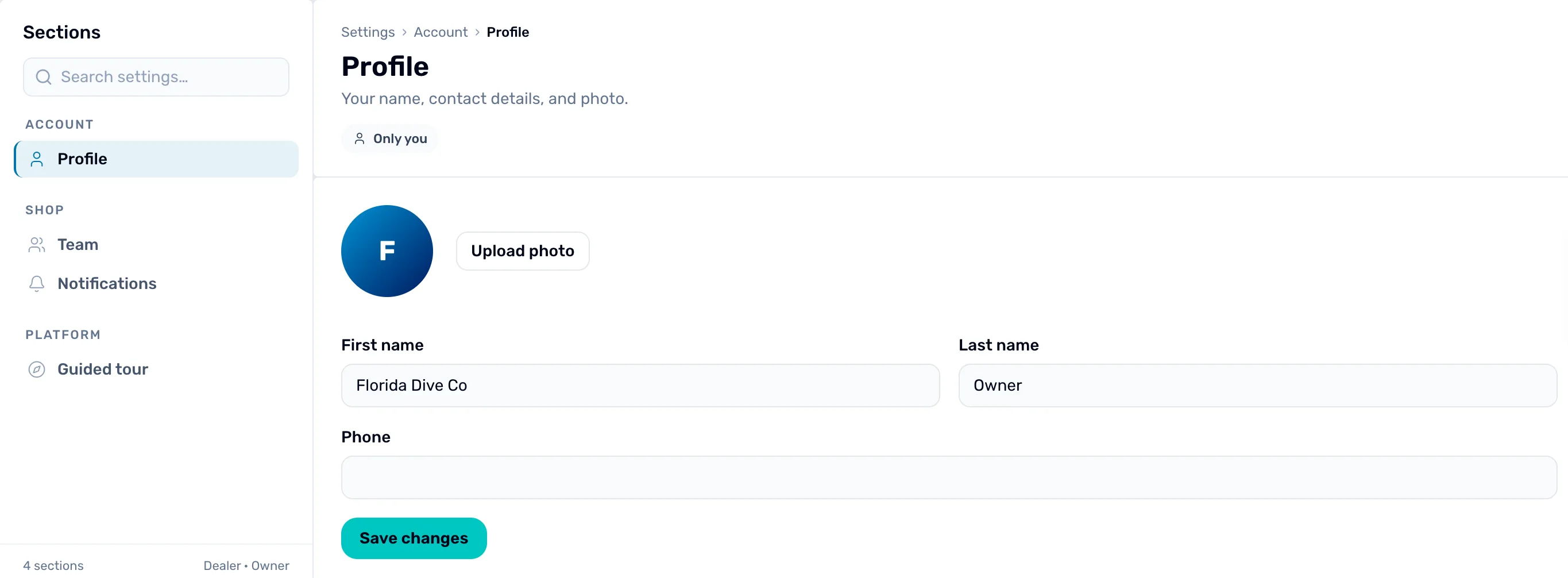 Settings › Account › Profile, with Profile picked under Account in the Sections list on the left: the heading Profile, Your name, contact details, and photo., the Only you tag, a round letter F with Upload photo beside it, then First name Florida Dive Co, Last name Owner, an empty Phone, and Save changes