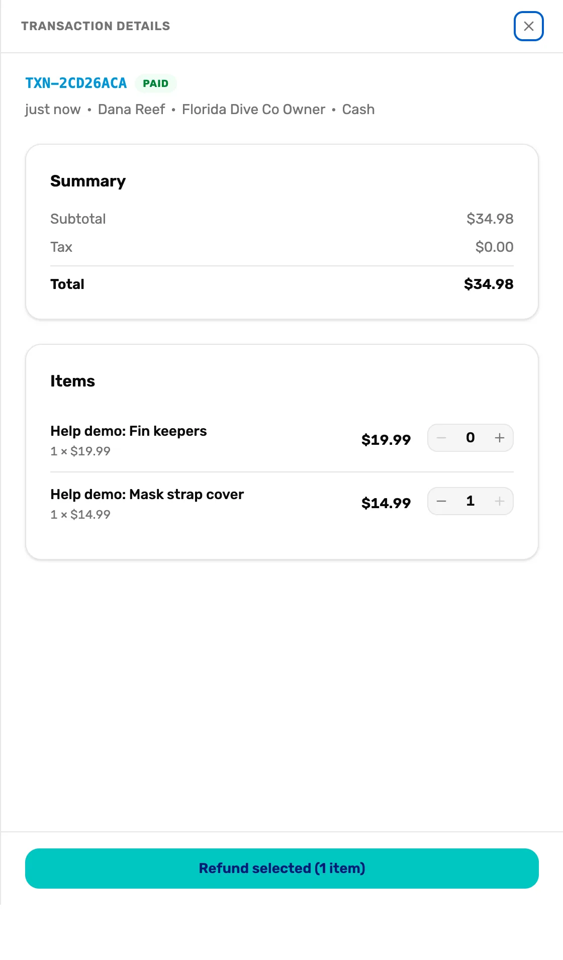 Transaction Details for TXN-2CD26ACA, Paid: Summary with subtotal $34.98, tax $0.00 and total $34.98; under Items, Fin keepers at 0 and Mask strap cover at 1; and Refund selected (1 item) at the bottom