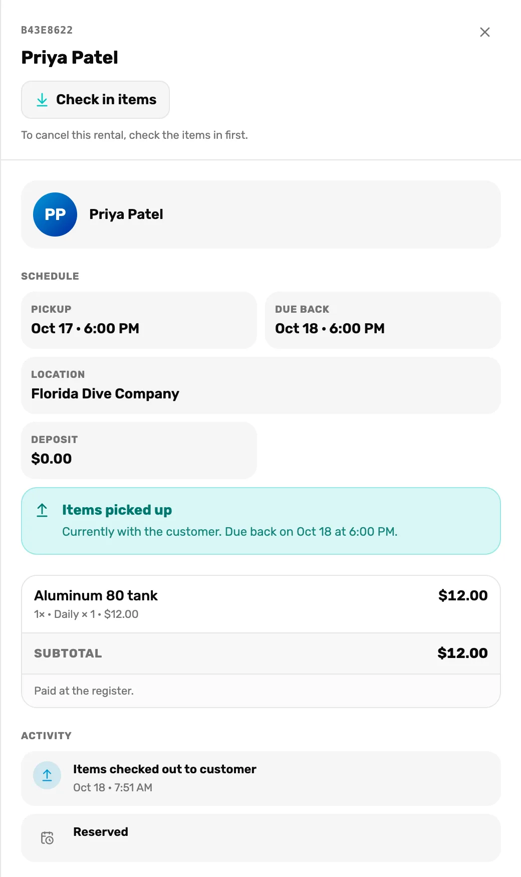 Priya Patel's booking open while out: Check in items at the top with To cancel this rental, check the items in first. under it, Pickup Oct 17 at 6:00 PM, Due back Oct 18 at 6:00 PM, Deposit $0.00, Items picked up, Currently with the customer, due back on Oct 18 at 6:00 PM, Aluminum 80 tank 1× Daily × 1 at $12.00, Paid at the register., and Activity with Items checked out to customer on Oct 18 at 7:51 AM and Reserved