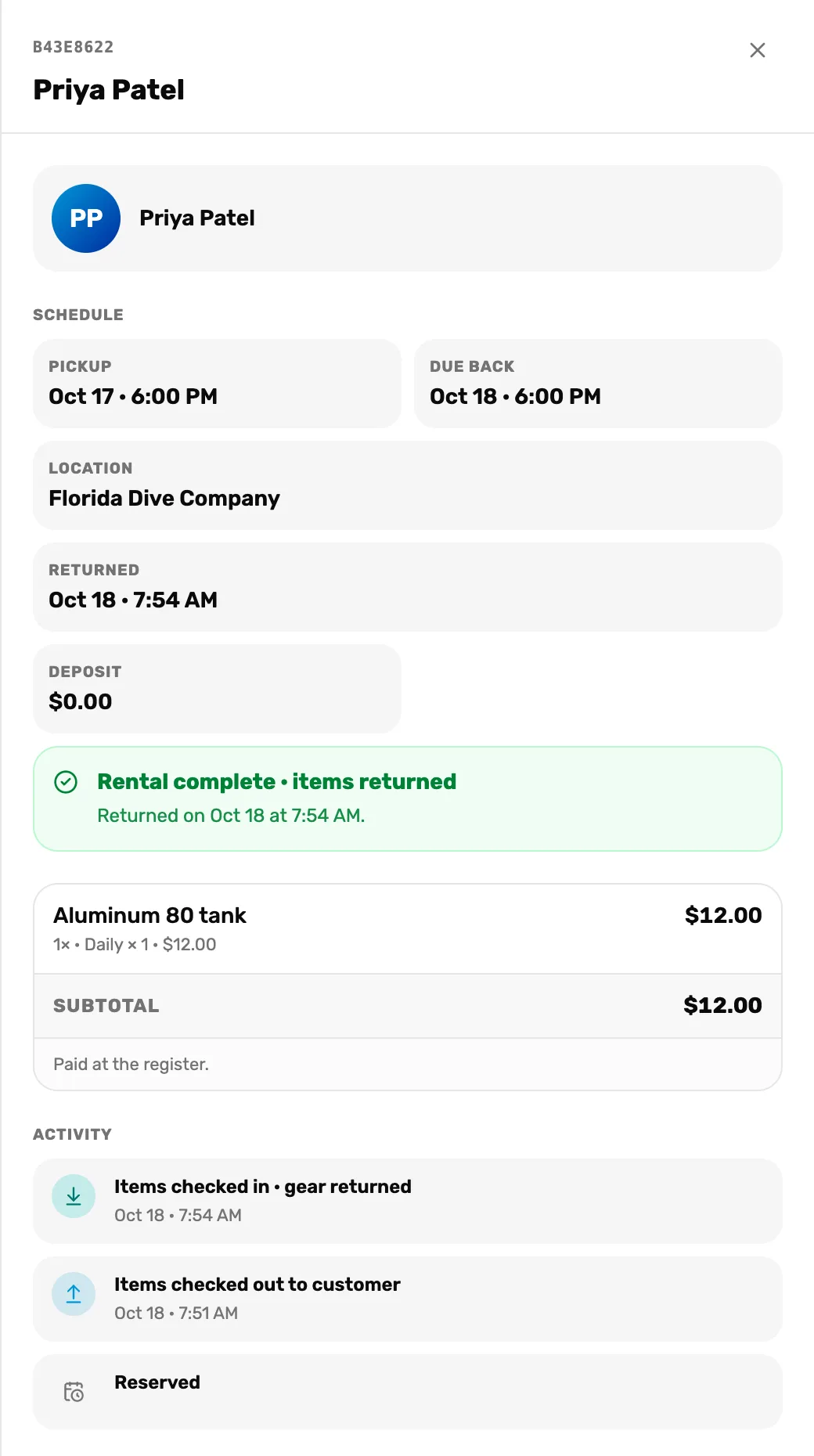 The same booking after check-in: no buttons at the top, Returned Oct 18 at 7:54 AM, Rental complete · items returned, Paid at the register., and Activity starting with Items checked in · gear returned