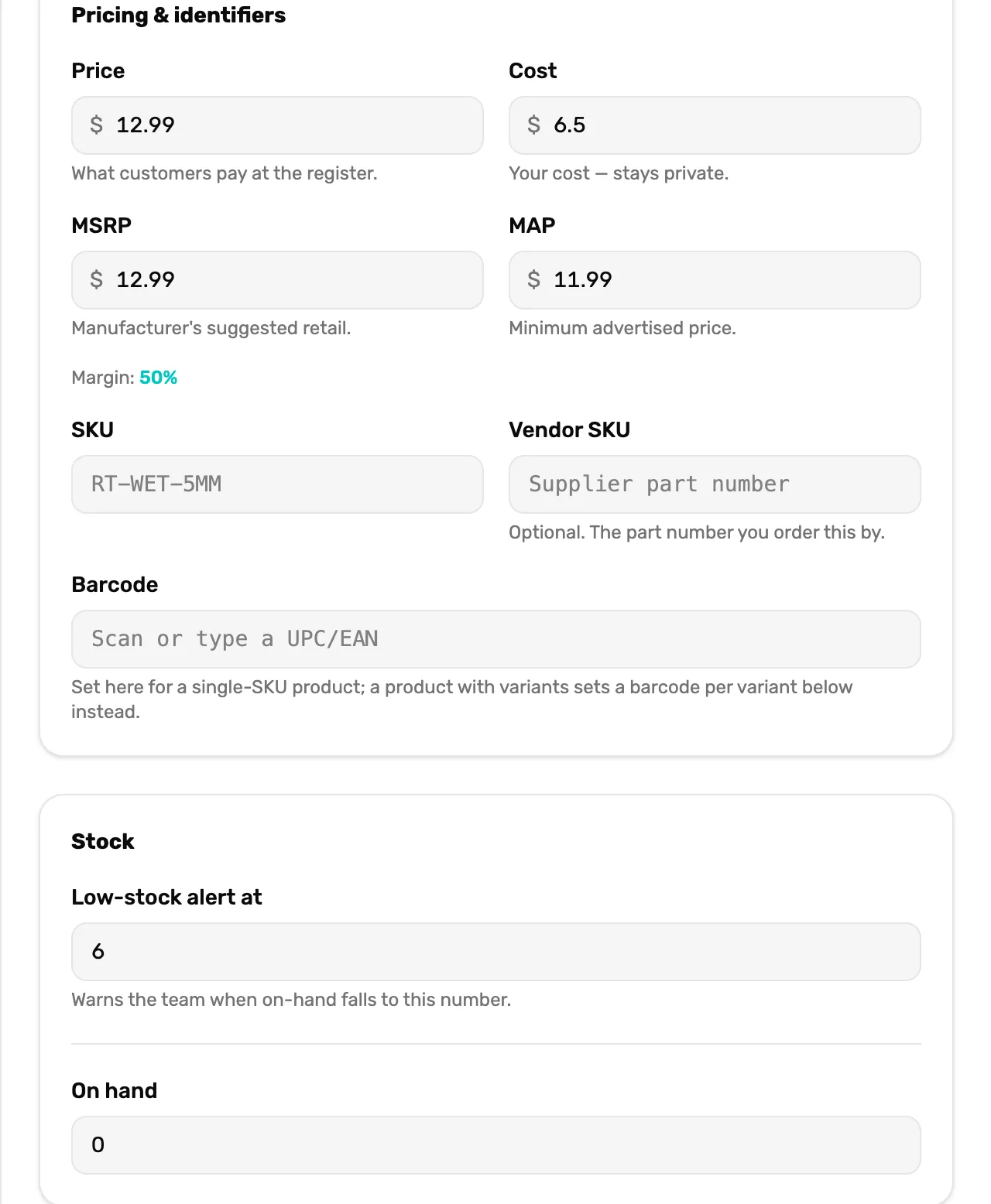 The Pricing and identifiers card of the copy: Price, Cost, MSRP and MAP filled in from the old product with its margin, and SKU, Vendor SKU and Barcode empty; under it the Stock card with Low-stock alert at filled in and On hand 0